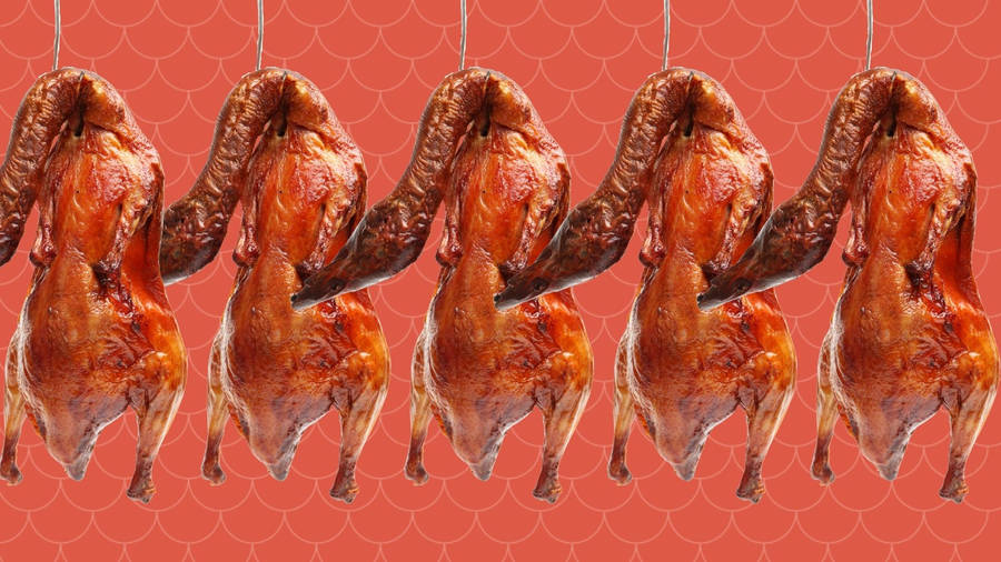 Caption: Authentic Roasted Peking Duck Hanging On Hooks Wallpaper