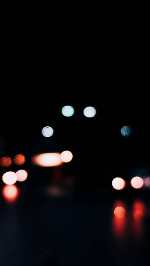 Caption: Captivating Blurry Colorful Lights Wallpaper