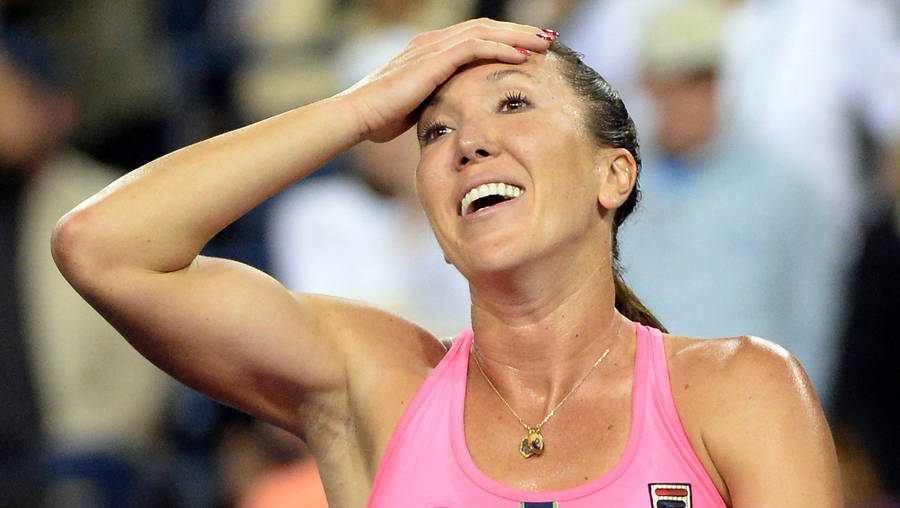 Caption: Deep In Thought - Tennis Pro Jelena Jankovic Wallpaper