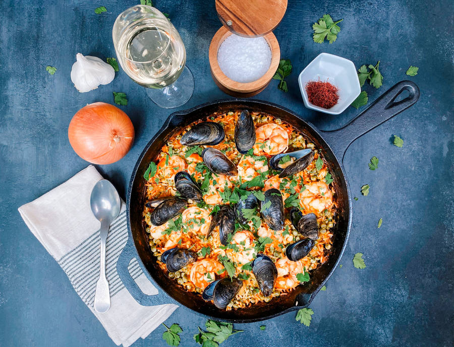 Caption: Delightful Seafood Paella In A Skillet Wallpaper