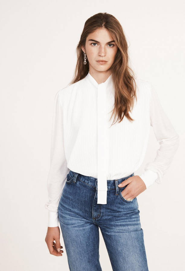 Caption: Elegance In Simplicity With Claudie Pierlot White Long-sleeved Top Wallpaper