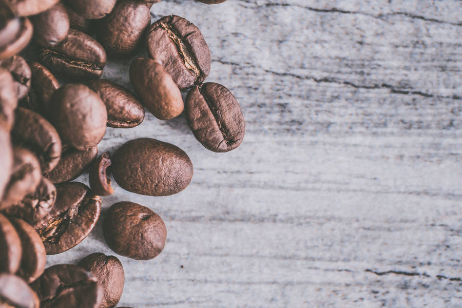 Caption: Exquisite Aesthetic Flat Lay Of Fresh Coffee Beans Wallpaper