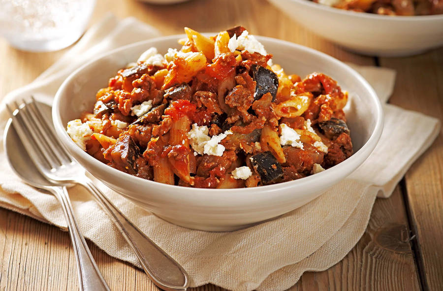 Caption: Hearty And Savory Mixed Moussaka In A Bowl Wallpaper