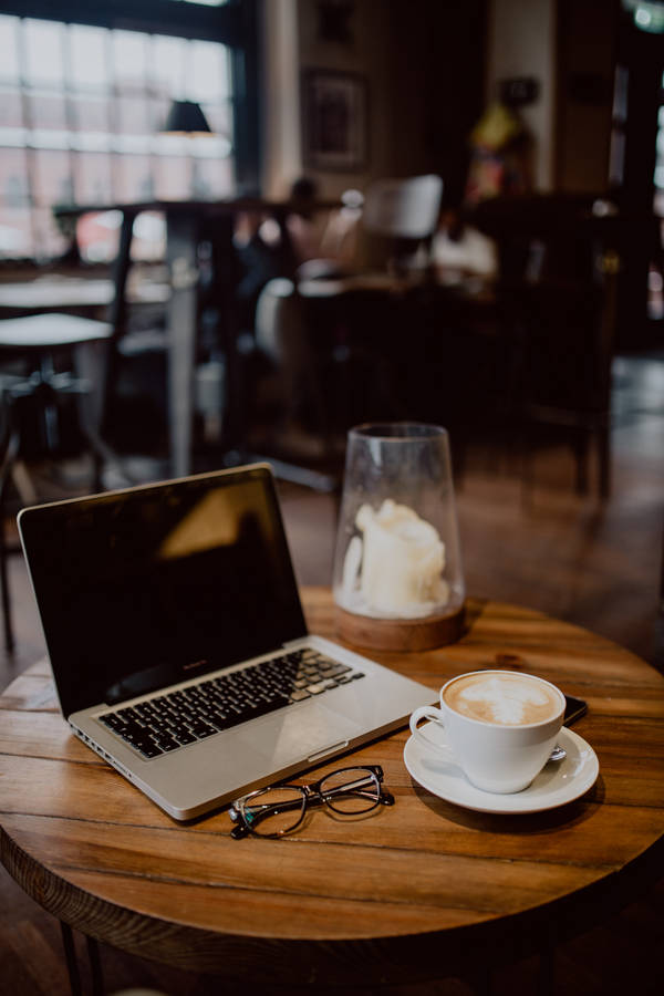 Caption: High-end Laptop With Sleek Design Wallpaper