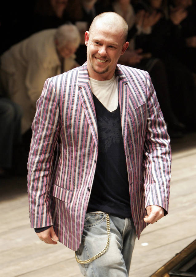 Caption: High Fashion With Alexander Mcqueen Striped Blazer Wallpaper