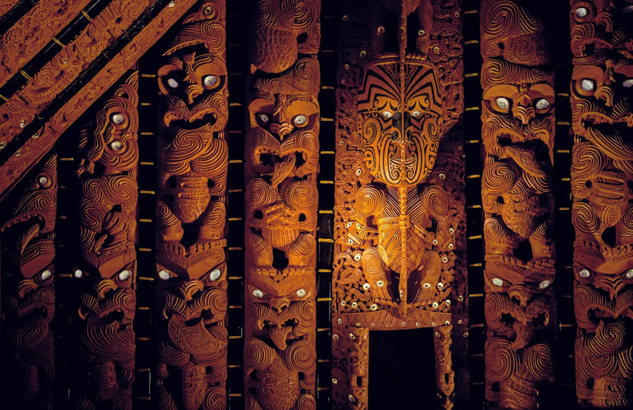 Caption: Intricate Maori Carvings In New Zealand Wallpaper