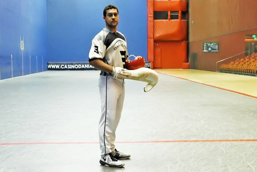 Caption: Jai Alai Player Gorka Aldazabal In Action Wallpaper