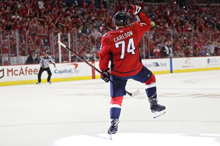 Caption: John Carlson Of Washington Capitals Celebrates Scoring A Goal Wallpaper