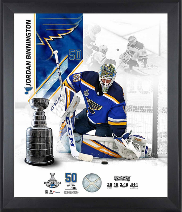 Caption: Jordan Binnington In Action - Champion Goaltender Wallpaper