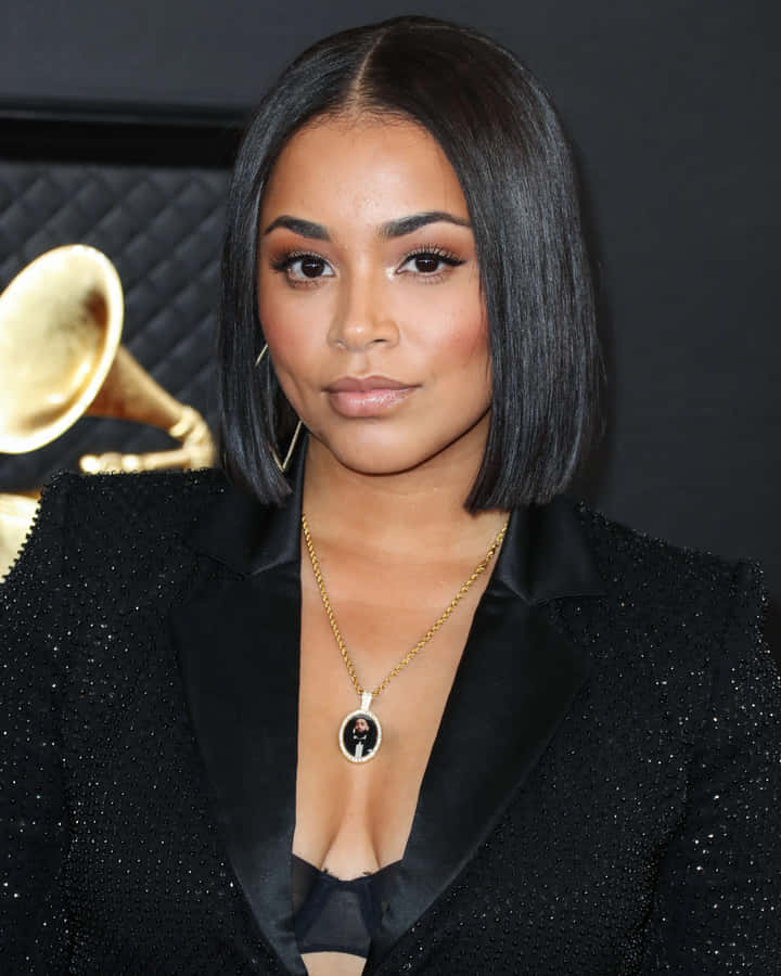 Caption: Lauren London At A Red Carpet Event Wallpaper