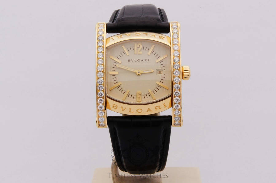 Caption: Luxurious Gold And Black Bvlgari Watch Wallpaper