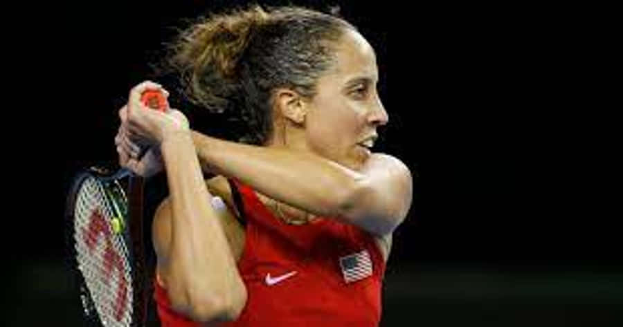 Caption: Madison Keys In Action During A Professional Tennis Tournament. Wallpaper