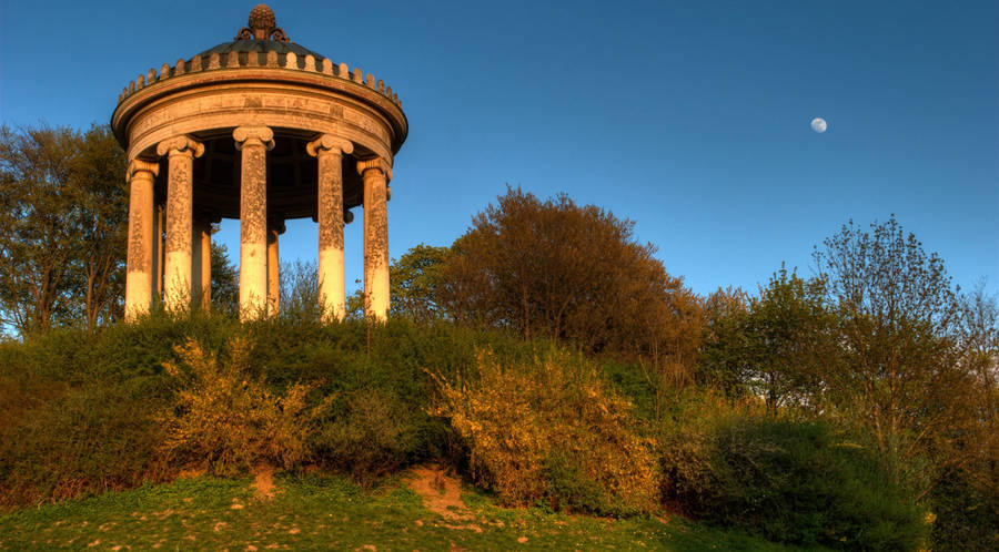 Caption: Majestic Monopteros In The English Garden, Munich Wallpaper