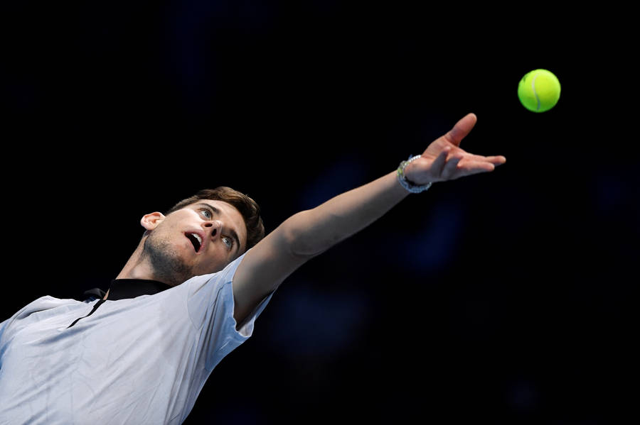 Caption: Professional Tennis Player Dominic Thiem In Action Wallpaper