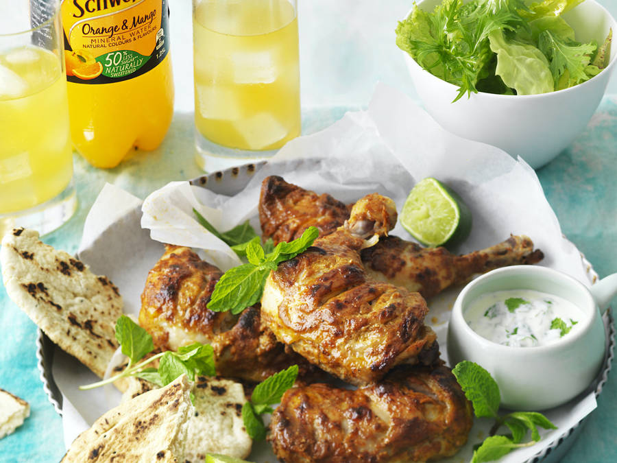 Caption: Scrumptious Tandoori Chicken With Mint Yogurt Dip Wallpaper