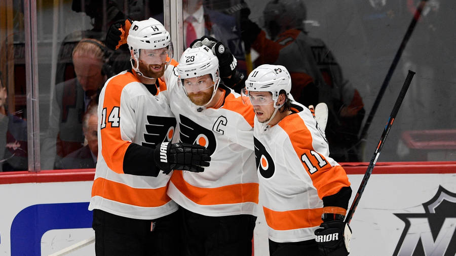 Caption: Sean Couturier Celebrating A Winning Moment Wallpaper