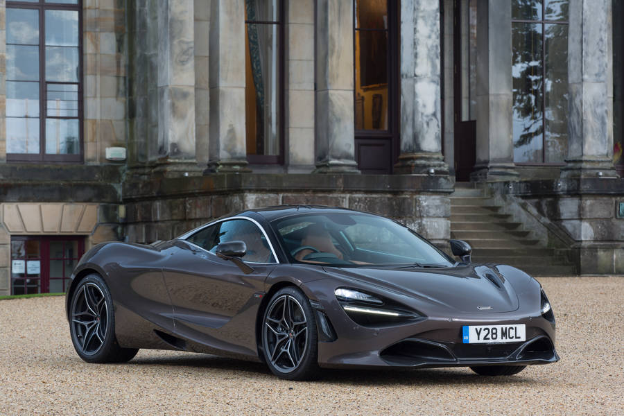 Caption: Sleek And Imposing Mclaren 720s In Dark Chrome Wallpaper