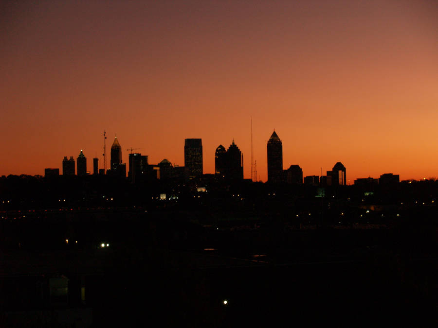 Caption: Spectacular Atlanta Skyline Silhouette At Twilight. Wallpaper