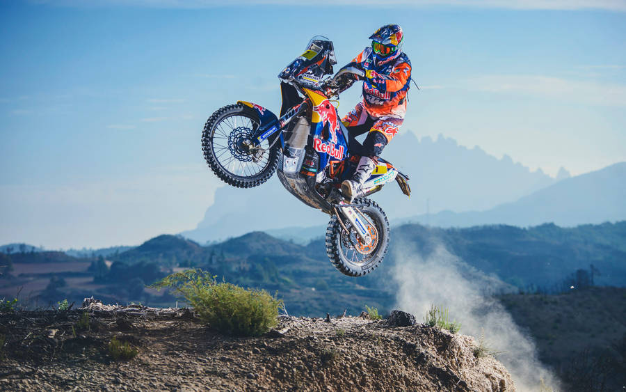 Caption: Thrilling Dakar Rally In Full Action Wallpaper