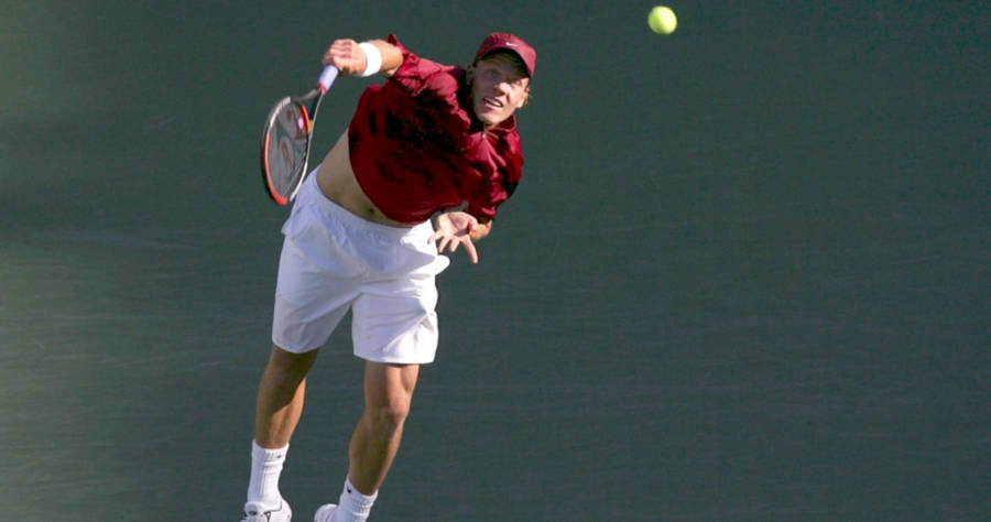 Caption: Tomas Berdych In Action - Smashing The Ball Mid-air Wallpaper