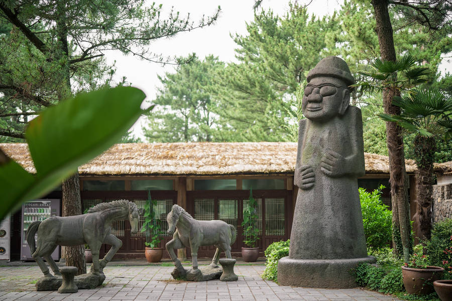 Caption: Traditional Jeju Island Folklore Village Wallpaper