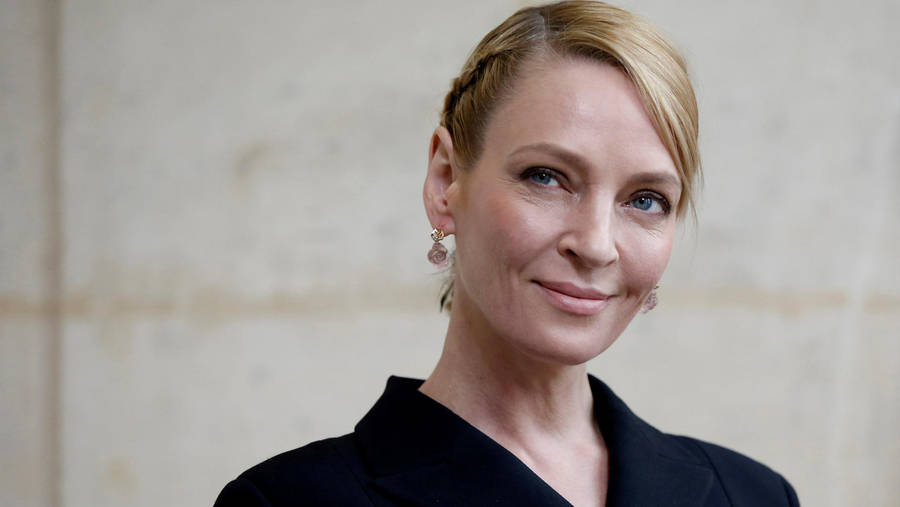 Caption: Uma Thurman's Elegant Fashion Statement Wallpaper