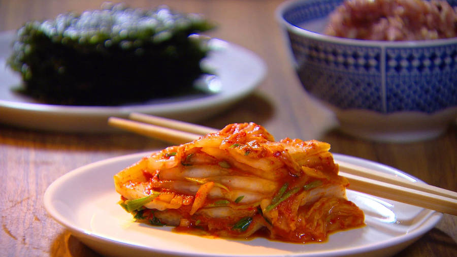 Caption: Vibrant And Flavorful Traditional Korean Kimchi Wallpaper