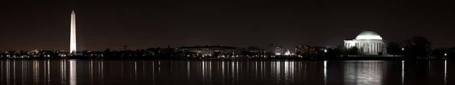 Captivating Darkness Across Three Monitors Wallpaper