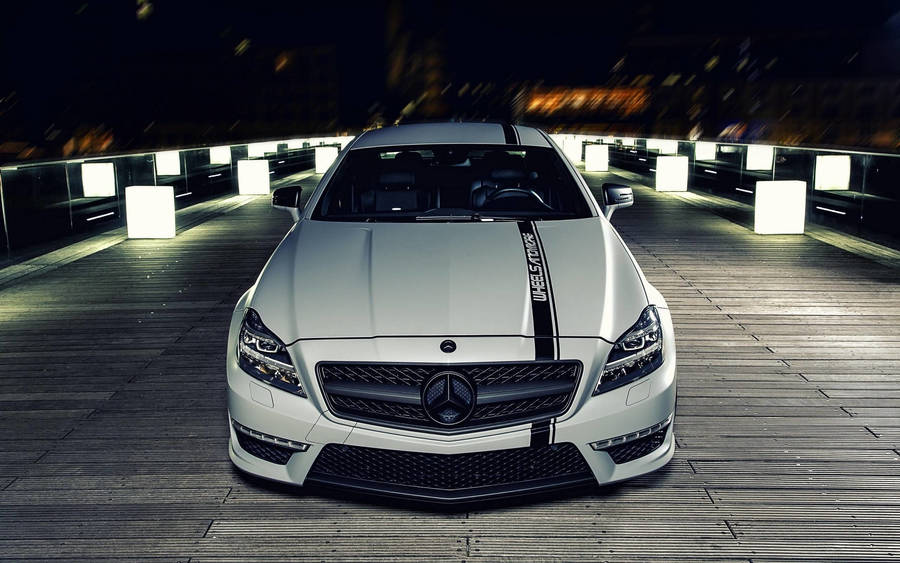 Captivating Night-time Prowess Of White Amg Wallpaper