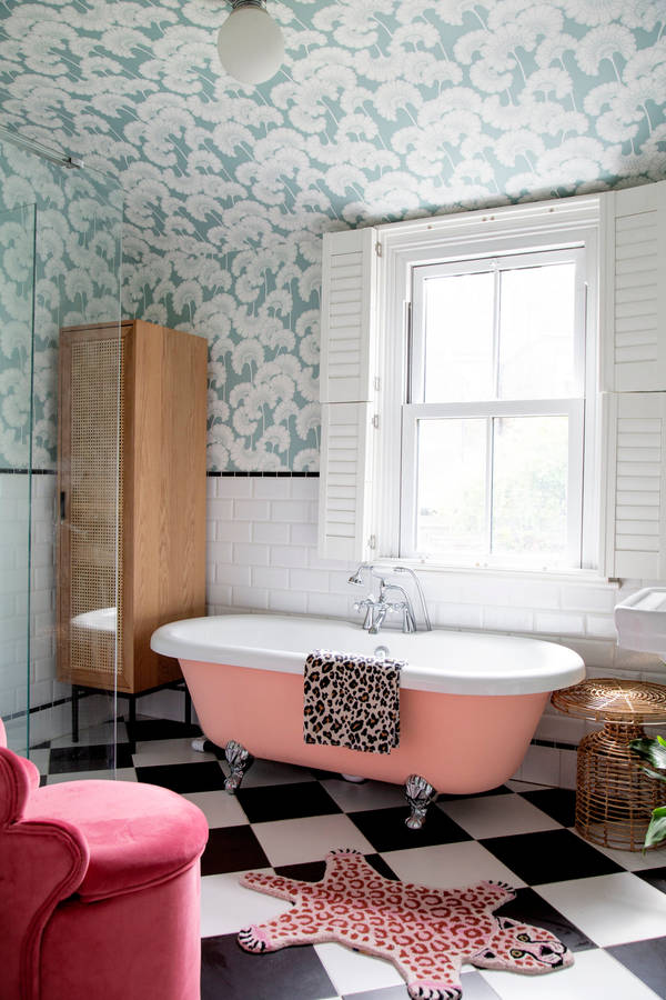 Captivating Pink Bathroom With Classic White Bathtub Wallpaper