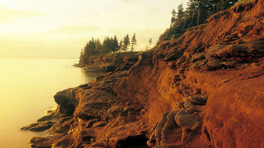 Captivating Solitude: Canadian Island At Dusk Wallpaper