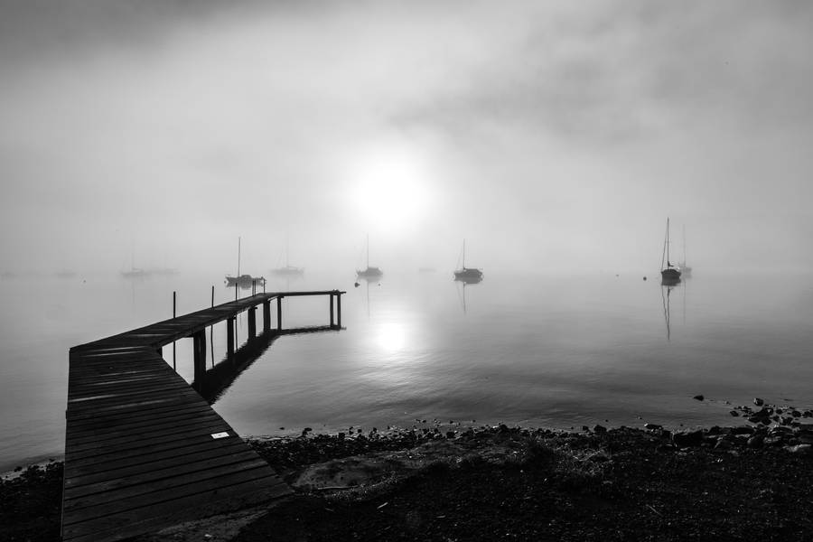 Captivating Tasmania Boardwalk Boats Scene Wallpaper