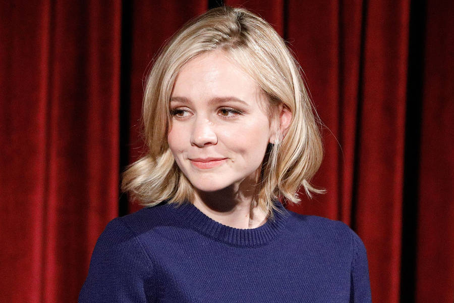 Carey Mulligan Showing Dimple Wallpaper