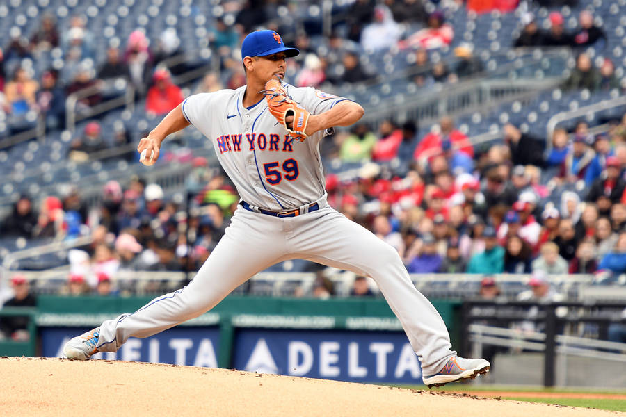 Carlos Carrasco In Blurred People Background Wallpaper