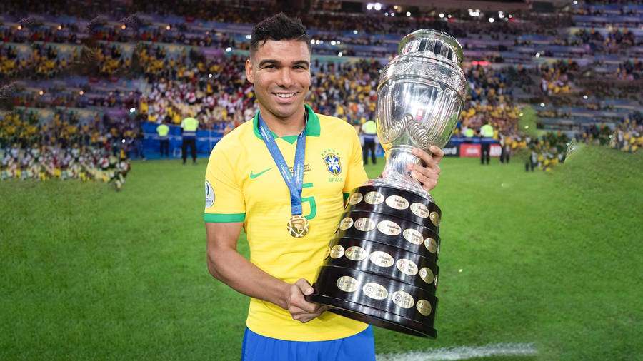 Carlos Casimiro Brazil Holding Trophy Wallpaper