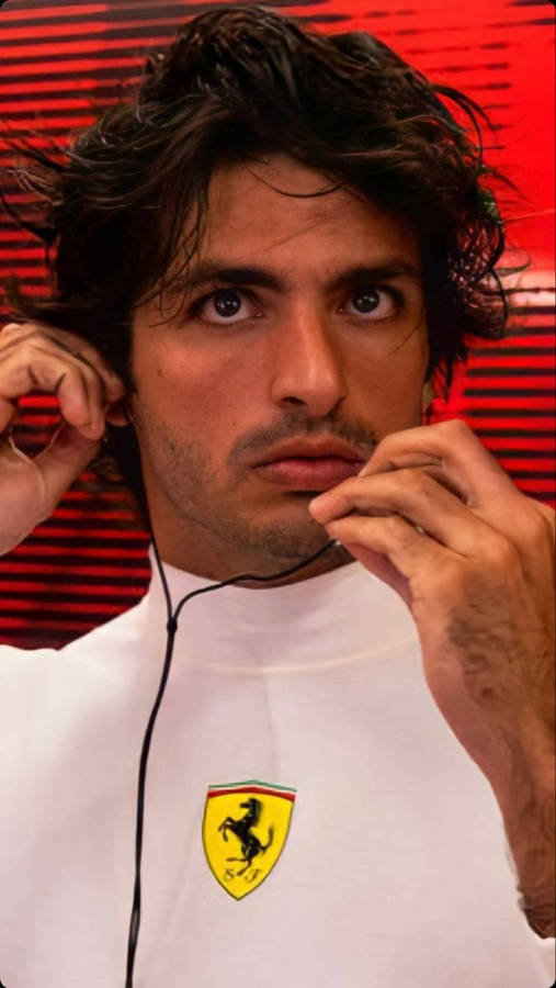 Carlos Sainz Jr Wearing His Earphones Wallpaper