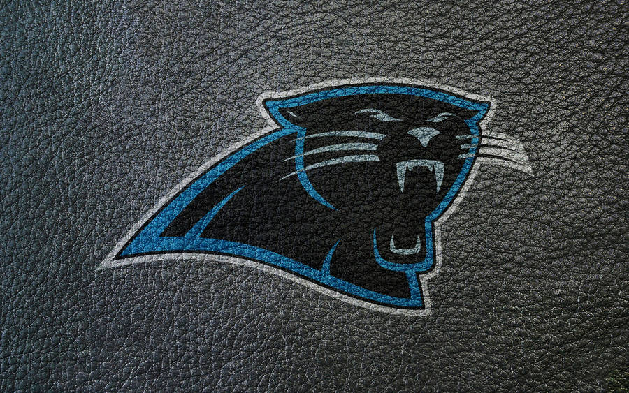 Carolina Panthers Logo On Leather Texture Wallpaper