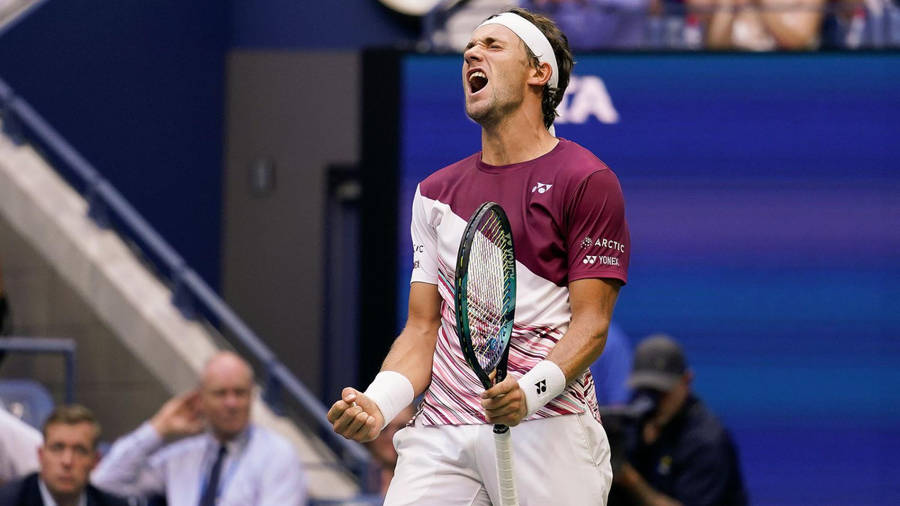 Casper Ruud Screaming While Holding His Racket Wallpaper