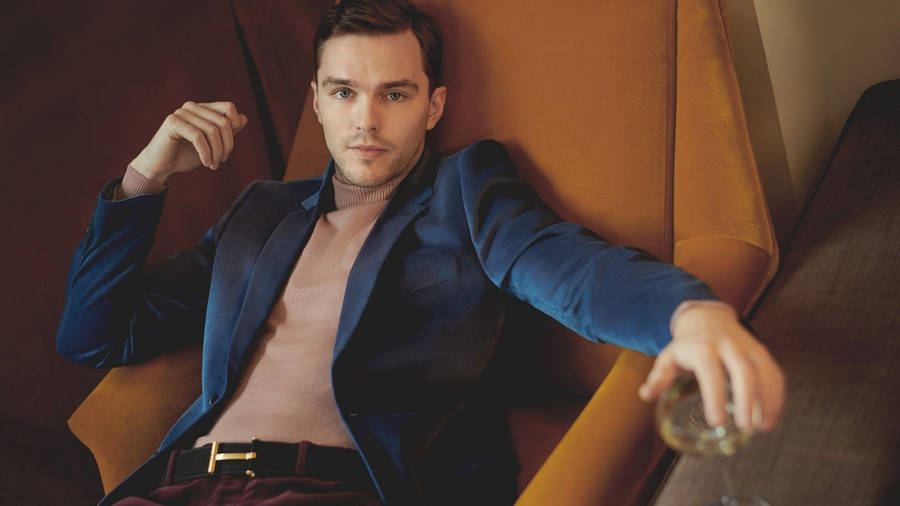 Casual Reflective Moments With Nicholas Hoult Wallpaper