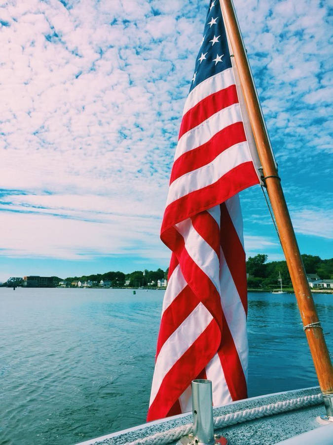 Celebrate Independence Day With A Vibrant Fourth Of July Parade Wallpaper