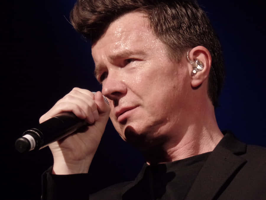 Celebrating The Music Of Legendary Singer And Songwriter Rick Astley Wallpaper