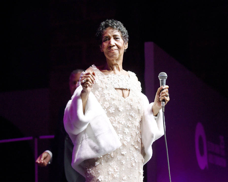 Celebrity Legend And Singer Aretha Franklin On Stage Wallpaper