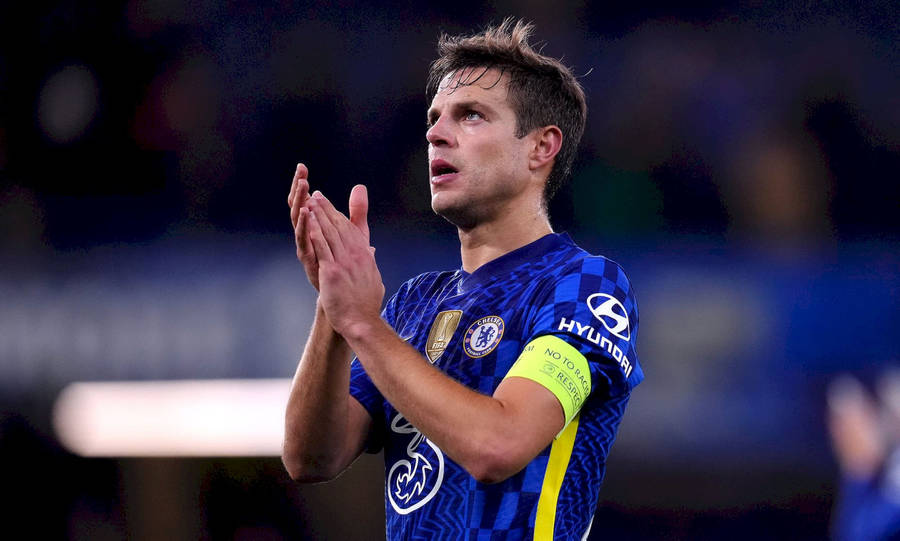 César Azpilicueta Clapping While Looking Up Wallpaper