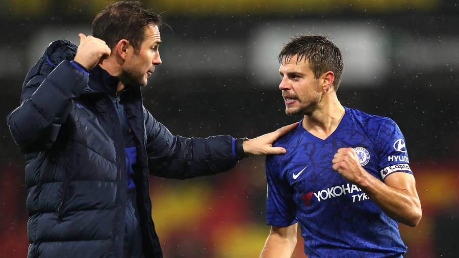 César Azpilicueta Fist Pump In Rain Wallpaper