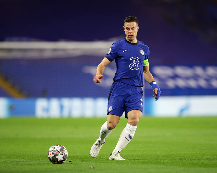 César Azpilicueta Running After Football Wallpaper