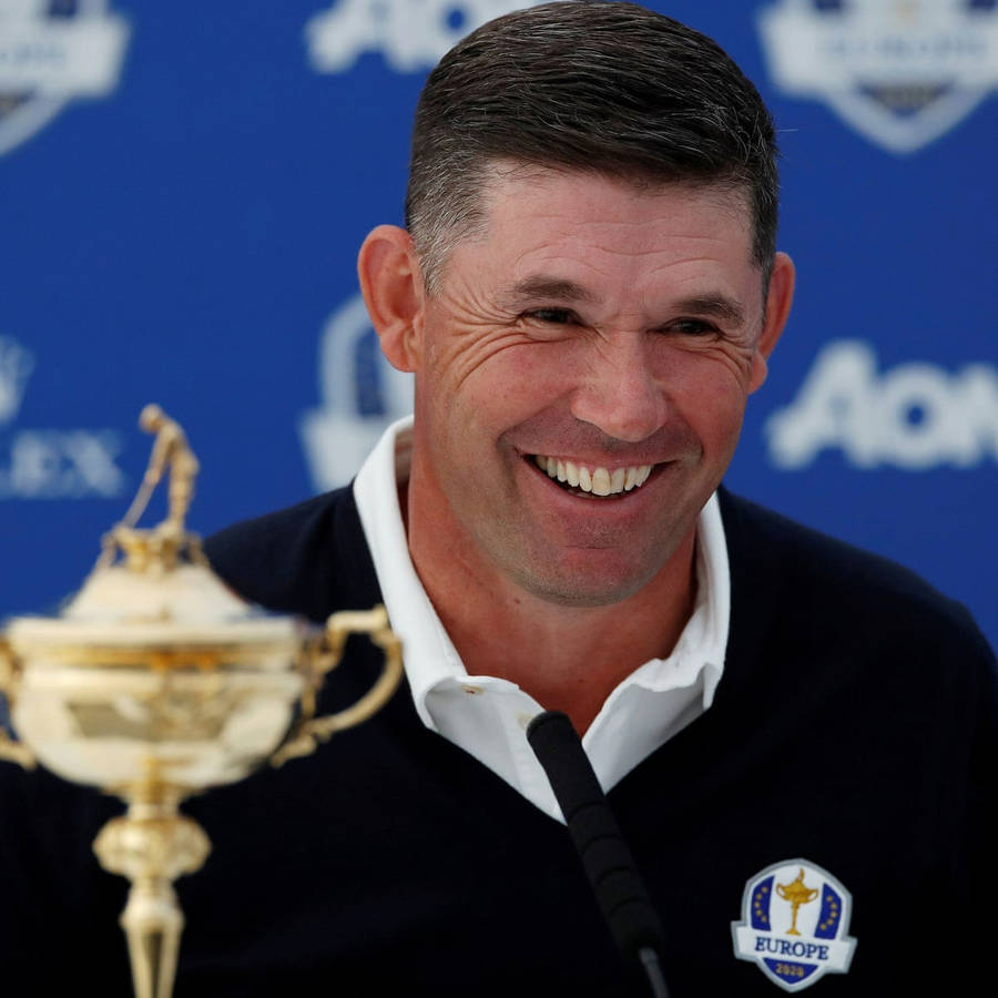 Champion Golfer Padraig Harrington In An Elated Victory Moment Wallpaper