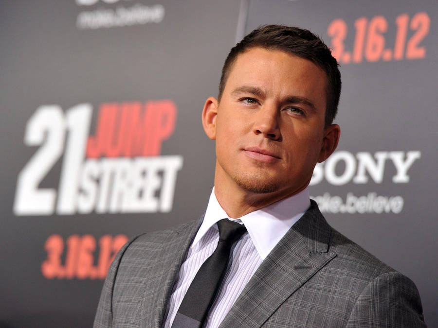 Channing Tatum At A Movie Premiere Night Wallpaper