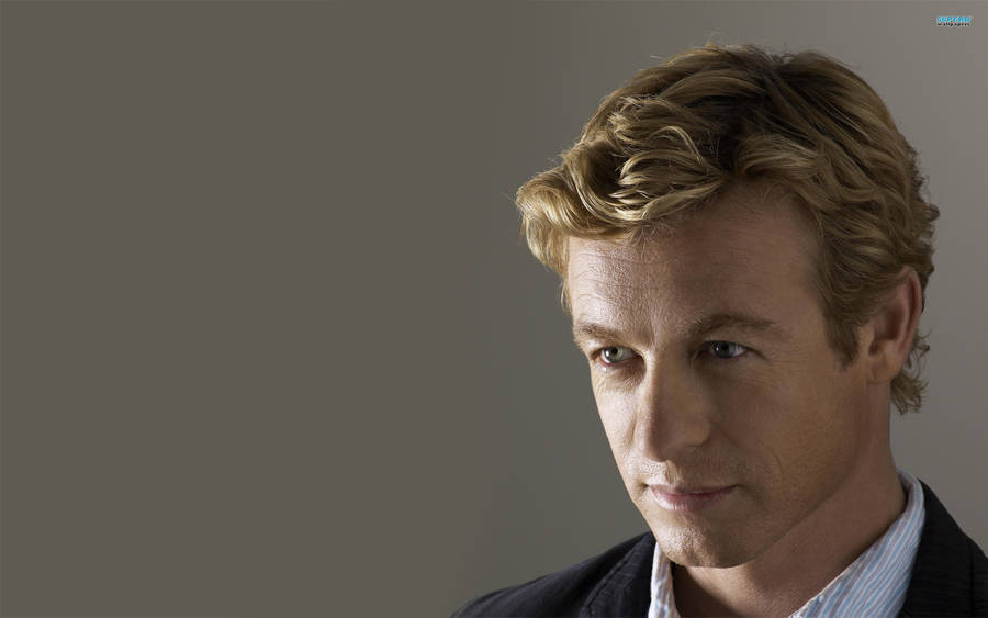 Charismatic Simon Baker As Patrick Jane In The Mentalist Wallpaper