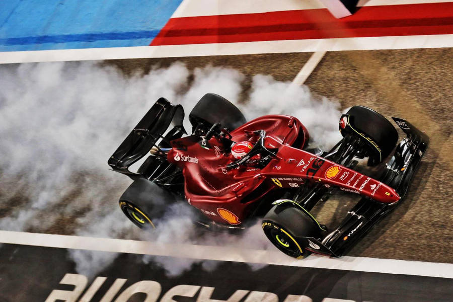 Charles Leclerc Making The Wheels Smoke Wallpaper