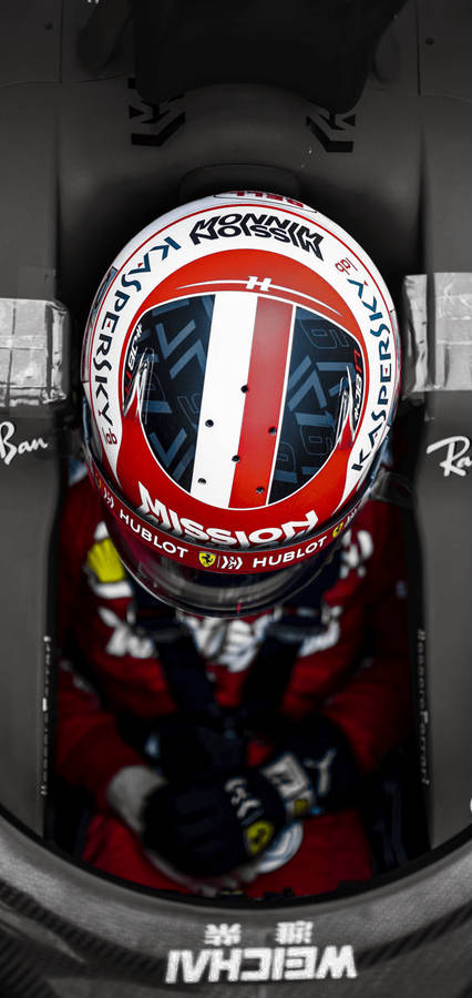 Charles Leclerc Wearing Helmet In Formula One Car Wallpaper